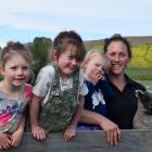 Munro Valley Farms manager Carla Murray and her children (from left) Bella (4), Lucy (6) and Fern...