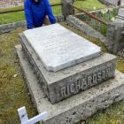 Dunedin military historian Peter Trevathan visits the grave of Major the Honorable Sir John...