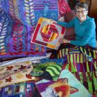Christchurch Quilters president Maria Rohs with her ‘vivid’ themed quilt. Photo: Geoff Sloan