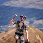 Josh Burnett celebrates after winning stage four of the Tour of Southland at The Remarkables...