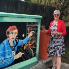 Millers Flat artist Sally Jory with her switchboard operator artwork on a Chorus cabinet in...