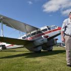 Mainland Air’s Phillip Kean stands alongside the de Havilland 89 Dragon Rapide/Dominie. PHOTO:...