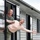 New home buyers Graham and Stella MacGregor celebrate their successful bid at the Otago...