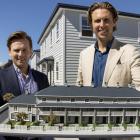 Oliver Hickman (left) and Vincent Holloway with a model of the Victorian-style townhouse...