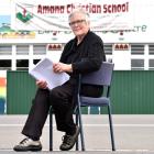 Sitting across the road from her school yesterday is Amana Christian School principal Roslyn King...