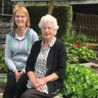 Fiona Webster and her mother Shirley Bockhout take a breather in their Sawyers Bay garden, which...