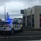 Police at the Hillside Rd TAB after a robbery Sunday afternoon. Photo: Hamish MacLean