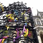 Ribbons symbolising solidarity with abuse survivors are tied to the gates of Dunedin’s St Joseph...