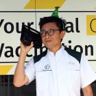 Roslyn Pharmacy director Andrew Hou listens to a Covid-19 update, which is where pharmacies learn...