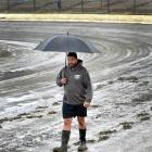Walking along the ruined track after the Beachlands Speedway club event was cancelled yesterday...