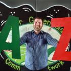 Greater Green Island Community Network community development worker Ben McKenzie shows off some...