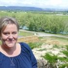 Brain cancer survivor Rachel Harrison enjoys the summer sun at her Kaitangata home yesterday....