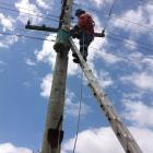 Evaluating the local network prior to the deployment of the Blueskin Energy Network. Photos:...