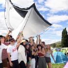 University students from Otago and Canterbury get ready to pitch a tent at the Rhythm &amp; Alps...