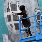 The Taranaki artist known professionally as Milarky puts the final touches on the large-scale...
