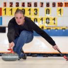 Demonstrating curling at the Dunedin Ice Stadium is Murray Pitts. PHOTO: STEPHEN JAQUIERY