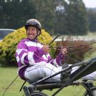 Oamaru’s Matthew Williamson celebrates his 1000th New Zealand driving win, on his home track...