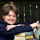 Leaning on a selection of library books yesterday is Otago Girls’ High School pupil Lauren...