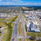The proposed flyover will connect residential Rolleston (left of State Highway 1) with the...