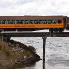 Dunedin Railways’ Seasider train crosses the Waitati River. PHOTO: STEPHEN JAQUIERY