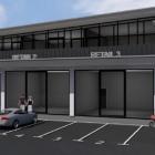 An artist’s rendering of a three-shop retail and office complex coming to the site of the former...