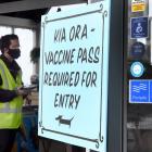 Security guards have been employed to check vaccine passes at the entrance to the Dog with Two...