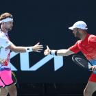 Michael Venus of New Zealand (left) and Tim Puetz of Germany. Photo: Getty Images