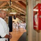 Seido Karate Dunedin dojo head instructor and sixth degree black belt Kelvin Lewis notes a newly...