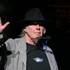 Neil Young thanked his record label for "standing with me in my decision to pull all my music...