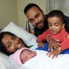 Gathering round Mirah Mariam Anit, the first baby born in Dunedin Hospital this year, are parents...