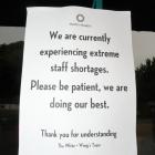 A notice on the window of Queenstown restaurant White + Wong’s. PHOTO: PHILIP CHANDLER