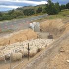 Fynn Mitchell moves a flock of sheep through a new underpass on his family farm near Lumsden....