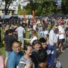 Crowds converge on Tent City in the Museum Reserve yesterday.