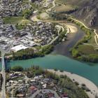 The darker Manuherikia River meets the Clutha below the town centre at Alexandra. PHOTO: STEPHEN...