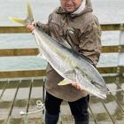 Dunedin fisherman Peter Srey with the 103cm kingfish he caught from the Boiler Point wharf on...