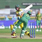 Australia’s captain Meg Lanning pushes the ball out of the reach of South Africa’s wicketkeeper...
