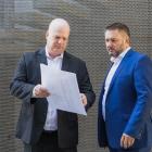 T4 Group directors Jason Porter (left) and David Simpson hold plans for their data centre to be...