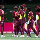 West Indies players celebrate the wicket of New Zealand's Maddie Green. Photo by Phil Walter-ICC...