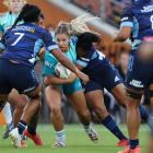 Amy du Plessis of Matatū looks for a way through the Blues defence during tonight's match. Photo:...