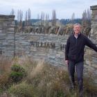 Alexandra property developer Russell Ibbotson at the gate of his planned subdivision. Photo: ODT...