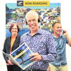 Business is booming for travel specialists (from left) Rachel Carr, Gary Harley and Paul Reid, at...