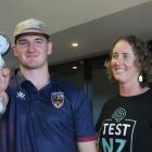 Headache Clinic founder Helen Tufui (right) helps Southland Stags player Rory van Vugt with his...