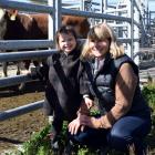 Beresford Farms owner Steph Burgess, of Puketiro, inspects a pen of her calves with her...