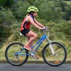 Vicky Aburn (9), of Fairfield School, competes during the cycle leg. Photos: Peter McIntosh