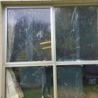 Damage to the windows in the Senior Citizens Hall, where Taieri Age Connect is based. PHOTO:...