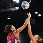 Southern Steel goal defence Kate Burley (left) competes with Mainland Tactix shooter Ellie Bird...