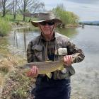 Mike Weddell holds a 2kg fish he caught on the Mathias Dam. PHOTO: SUPPLIED

