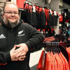 The Champions of the World Dunedin store manager Matthew Clifford stands in the George St store...