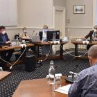 Dunedin city councillors met in person yesterday in the municipal chambers for the first time in...