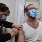 Te Kaika nurse manager Teresa Manahi administrators the seasonal flu jab to Minister of Health...